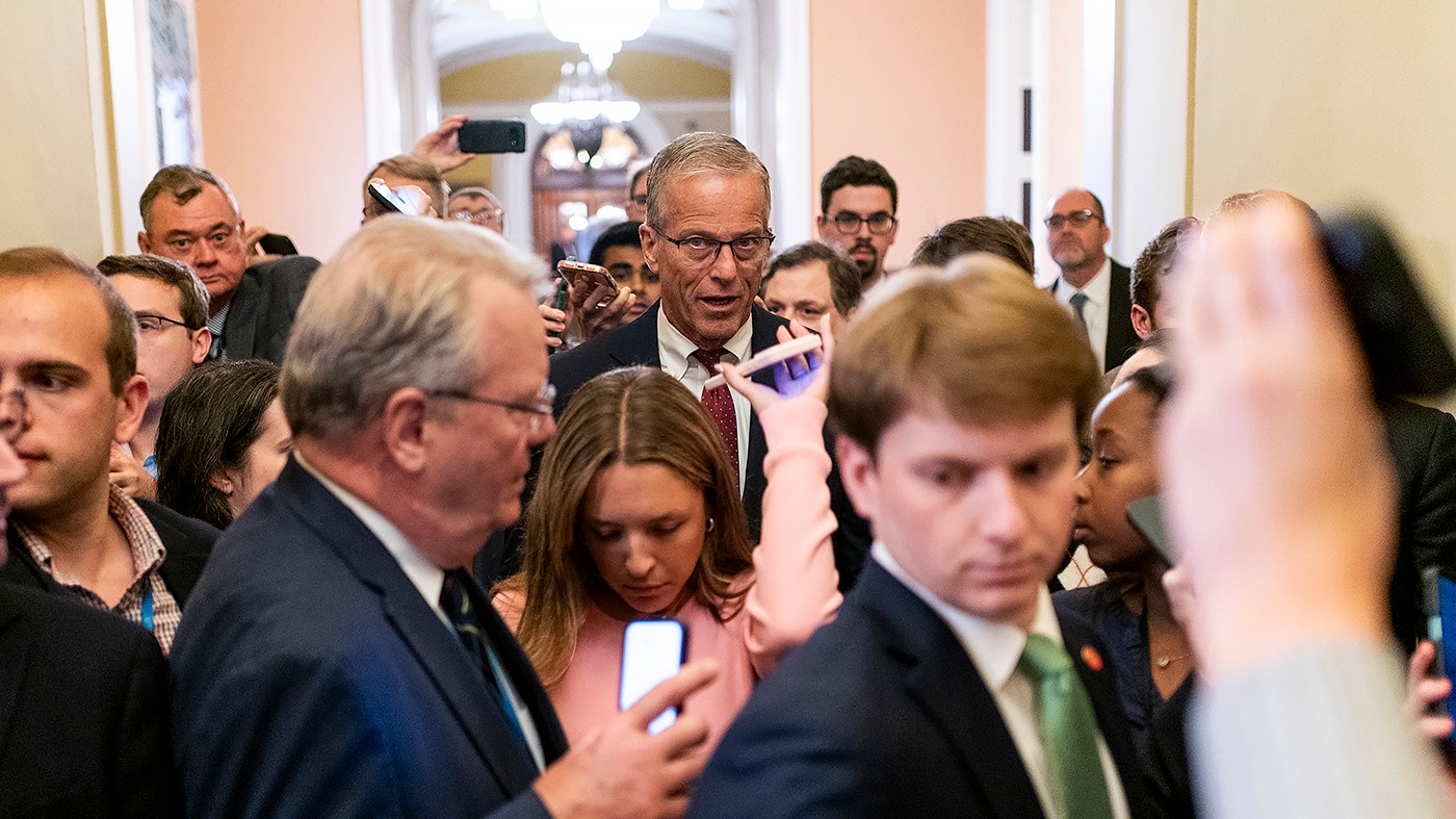 Senate Majority Leader John Thune (R-S.D.) talks to reporters as he returns to his office after speaking on the Senate floor on Sept. 22, 2026.