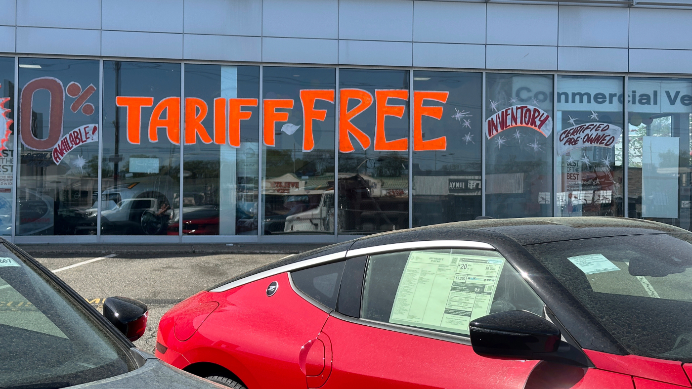 A Tariff Free sign to attract vehicle shoppers is at an automobile dealership in Totowa, N.J., on Wednesday, April 30, 2025. (AP Photo/Ted Shaffrey)