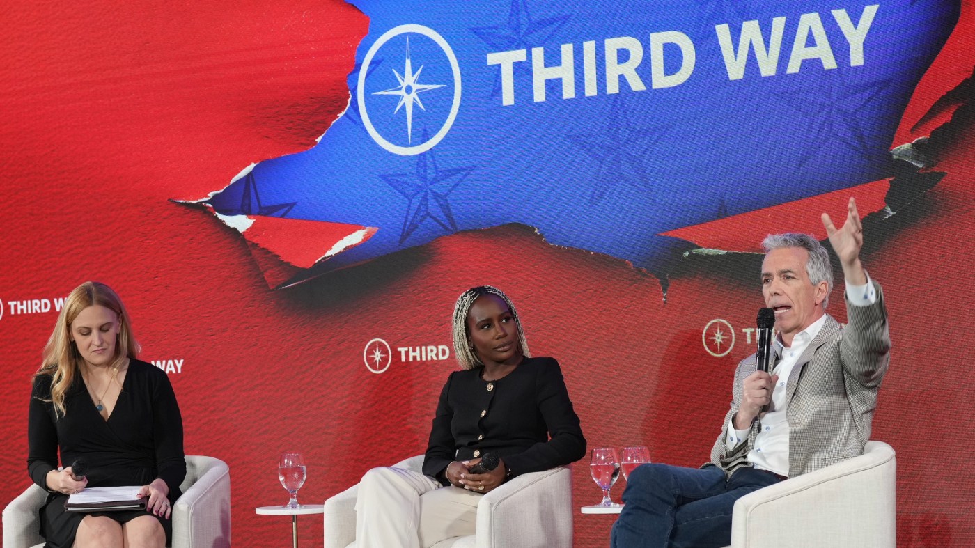 Former Rep. Joe Walsh, RIll., right, speaks about becoming a Democrat as moderator Sarah McCammon and panelist Yemisi Egbewole listen during Third Way’s “Winning the Middle” conference Monday, March 2, 2026, in Charleston, S.C. (AP Photo/Meg Kinnard)
