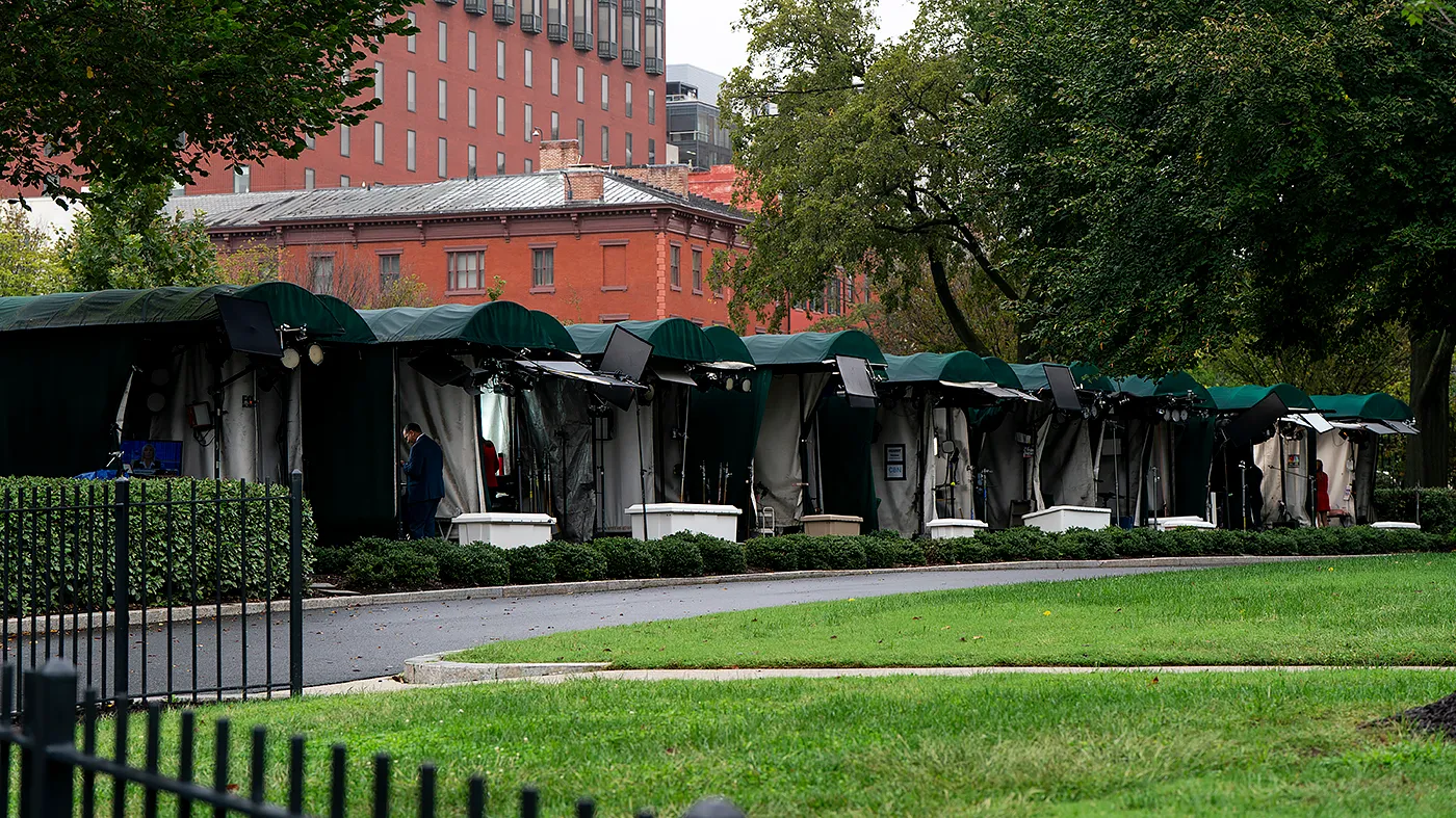 Network stands up are seen outside the White House in Washington, D.C., on Sept. 23, 2026. CNN, MS NOW and Politico have their first court appearance with the Trump administration to regain access.
