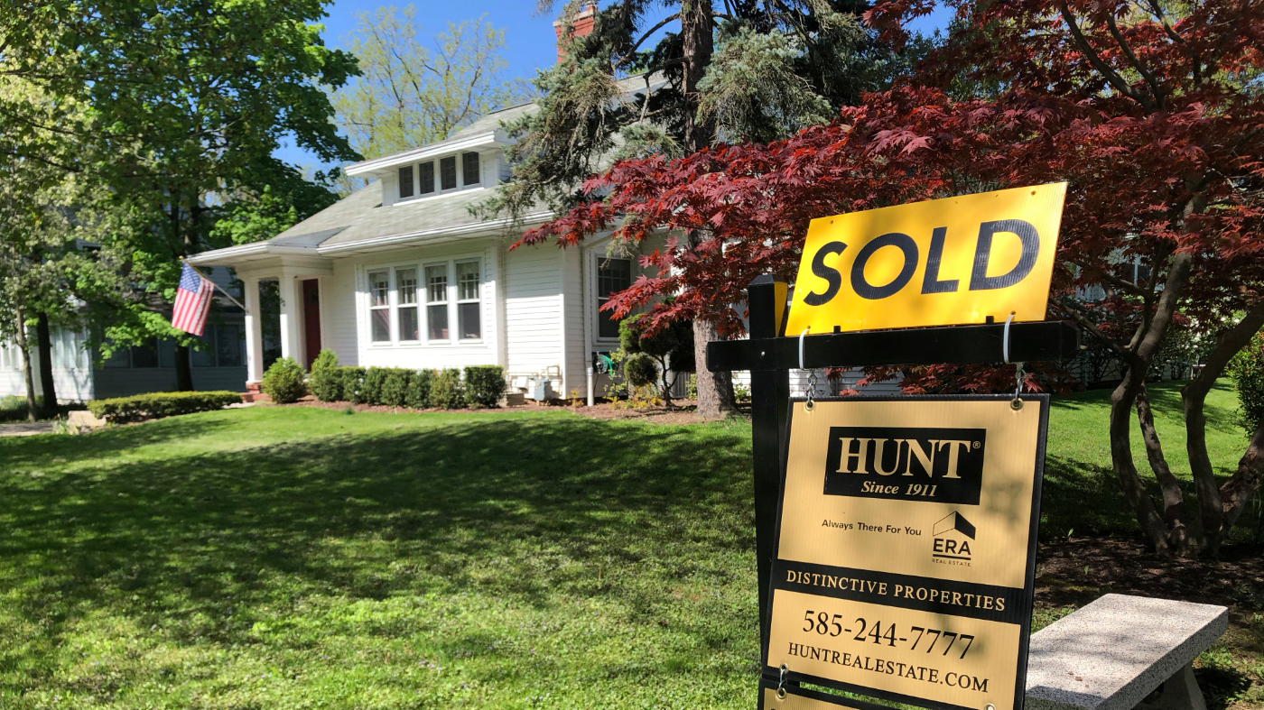 A sold sign stands in front of a house in Brighton, N.Y., May 22, 2020.