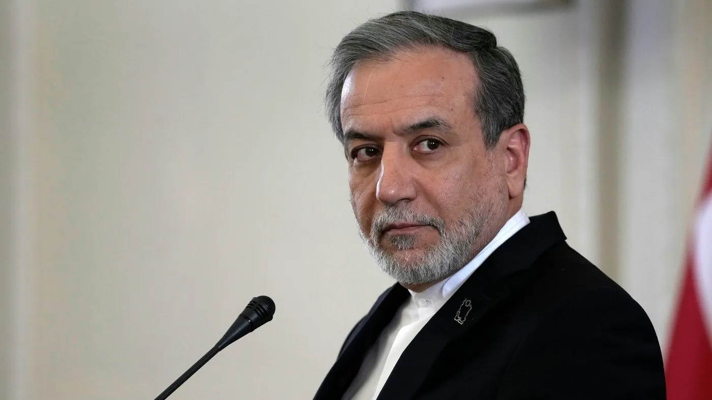 FILE – Iranian Foreign Minister Abbas Araghchi listens to a question in a joint press briefing with his Omani counterpart Sayyid Badr Albusaidi after their meeting in Tehran, Iran, Monday, Dec. 30, 2024. (AP Photo/Vahid Salemi,File)