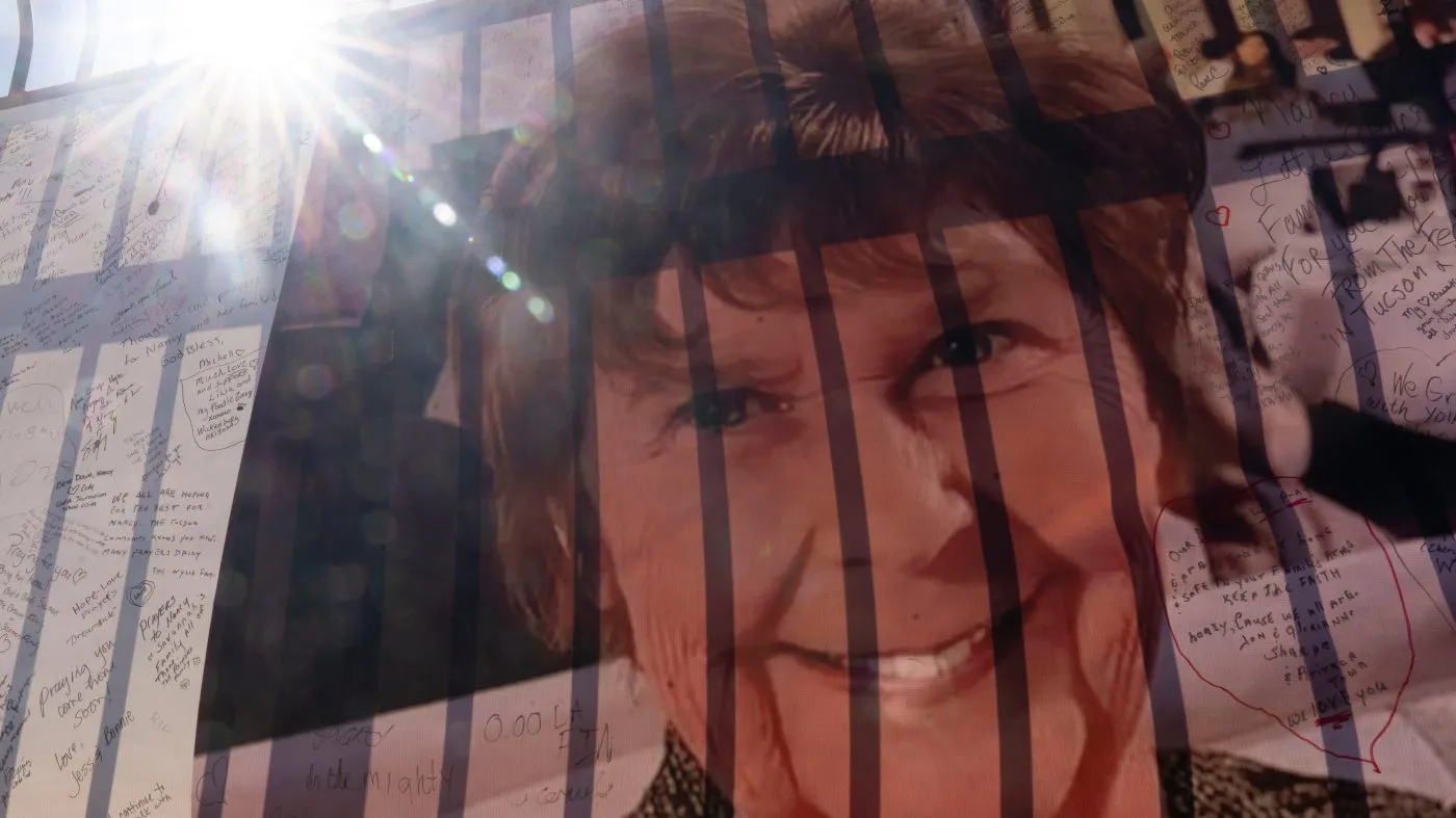 A banner with notes from hundreds of well-wishers and an image of Nancy Guthrie, the missing mother of “Today” show host Savannah Guthrie, outside the KVOA Newsroom in Tucson, Ariz., Friday, March 6, 2026. (AP Photo/Rebecca Noble)