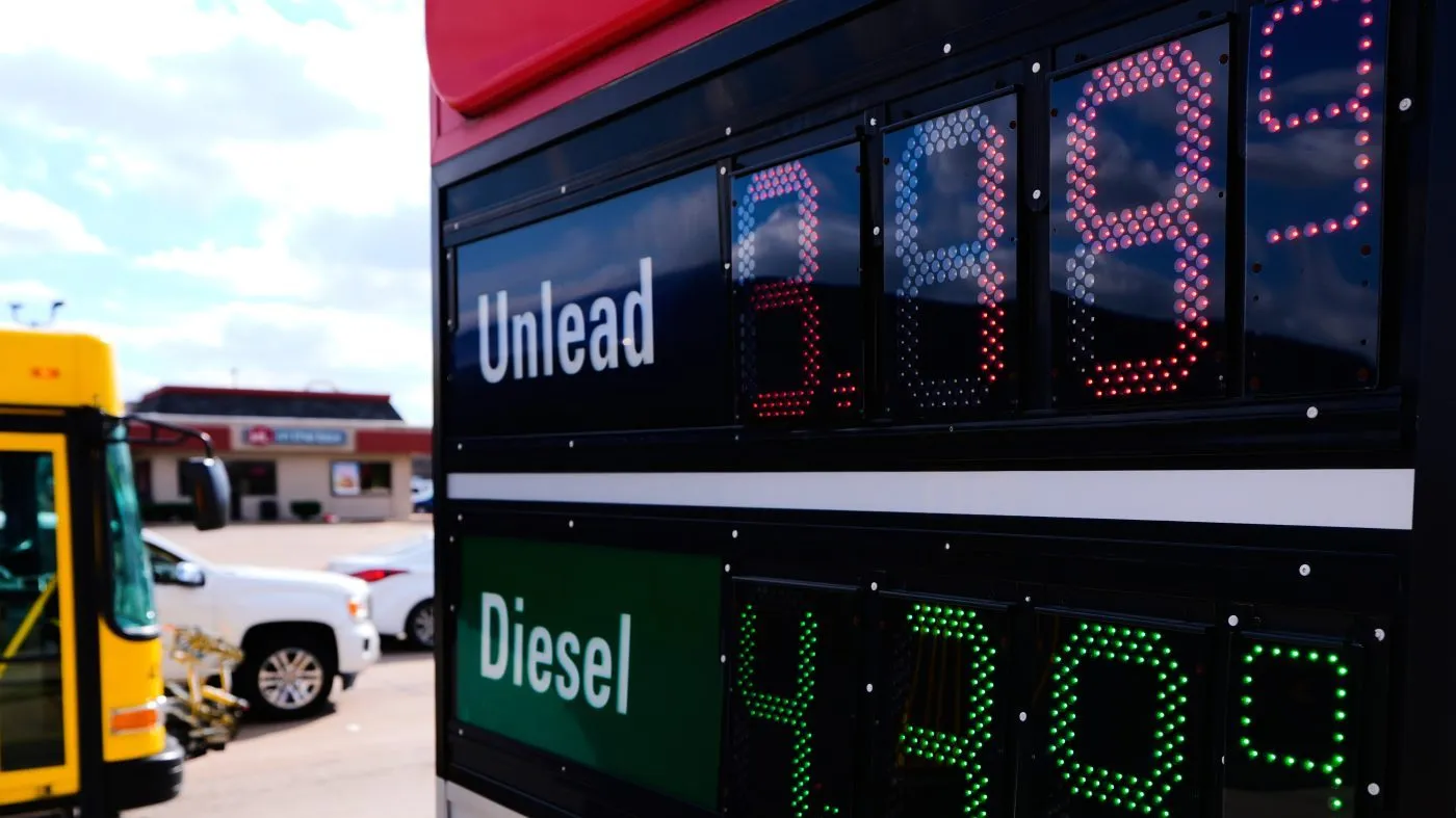 A sign reflects the current gas prices at a convenience store and filling station as motorist pass through an intersection in Garland, Texas, on March 9, 2026.