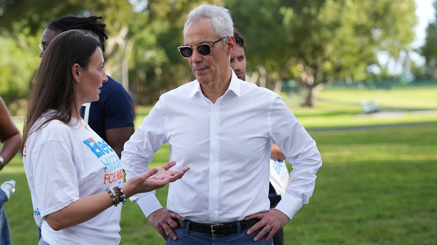 Nikki Fried, Chair of the Florida Democratic Party, left, talks with Rahm Emanuel, right, as they attend an event in support of former Miami-Dade County Commissioner and candidate for Miami mayor Eileen Higgins in advance of a runoff election in Miami Monday, Dec. 8, 2025.