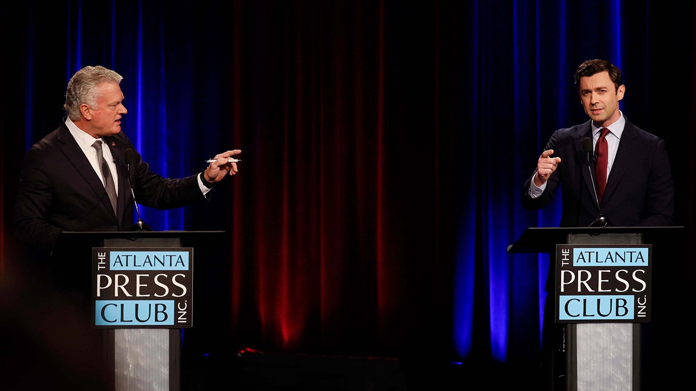 Republican U.S. Rep. Mike Collins, left, debates incumbent Democratic U.S. Sen. Jon Ossoff during the Loudermilk-Young Senate Debate Series at the Georgia Public Broadcasting studio in Atlanta on Oct. 13, 2026.
