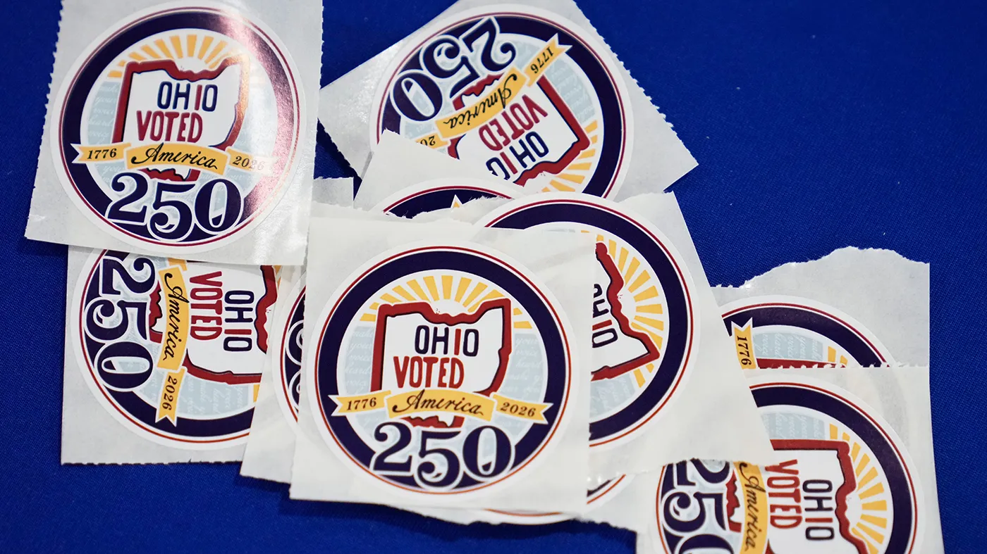 Voters receive stickers at early in-person voting in Cleveland, Oct. 7, 2026.