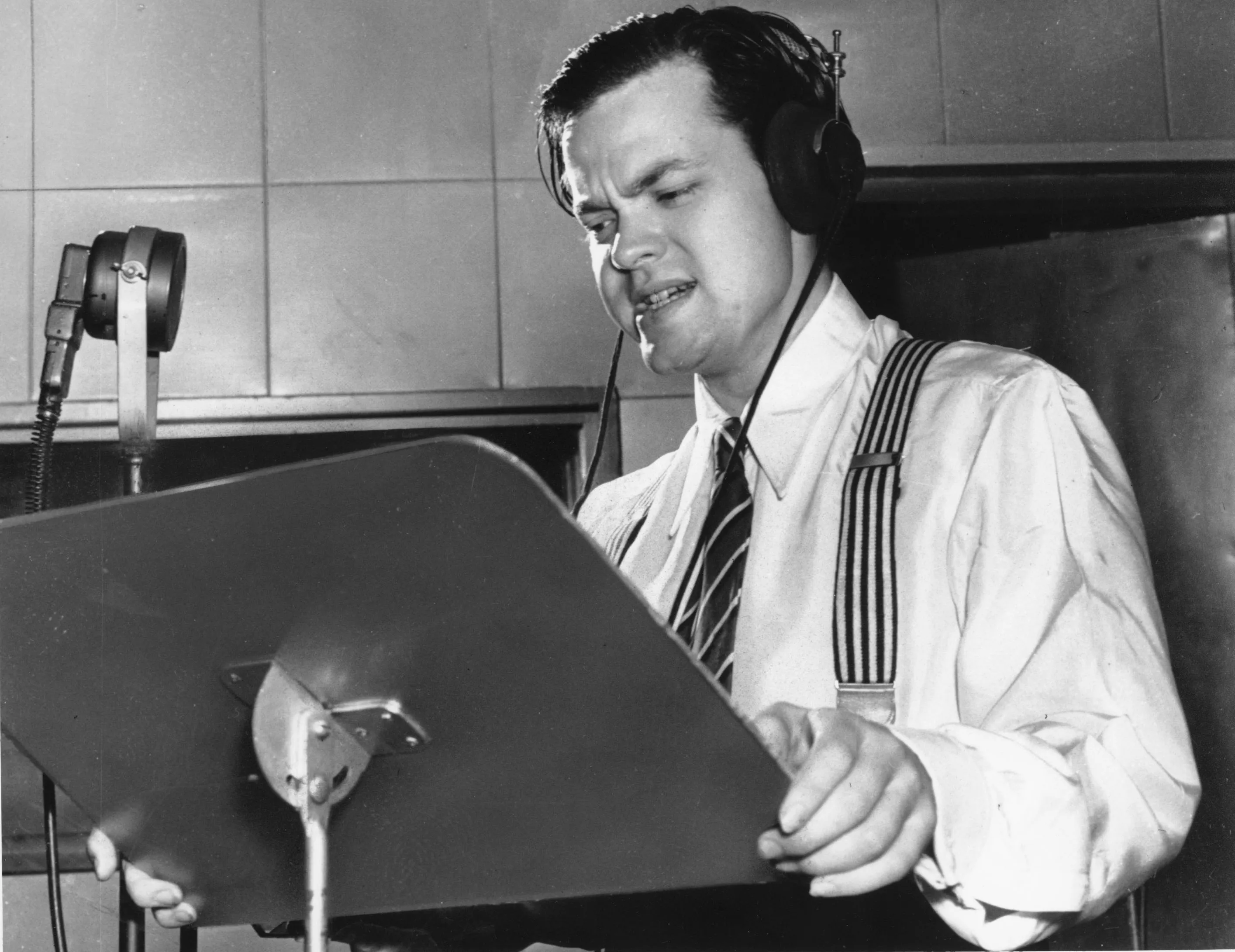 Orson Welles delivers a radio broadcast from a New York studio in 1938.