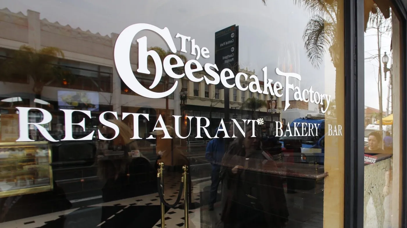 The Cheesecake Factory restaurant is seen in Old Pasadena Friday, Feb. 3, 2017. A man dressed in black threw a homemade incendiary device into the crowded California restaurant Thursday at dinnertime, and when it ignited, panicked patrons abandoned their meals and knocked over chairs as they rushed for the exits. But no one was hurt. Authorities described it as “homemade pyrotechnic device” but did not disclose its contents. Police is still looking for the man who threw it. The restaurant reopened Friday. (AP Photo Damian Dovarganes)