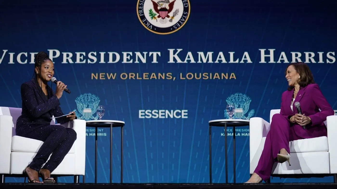 Then-Vice President Kamala Harris speaks with actor Keke Palmer, left, at an event as part of the Essence Festival of Culture in New Orleans, July 2, 2022.