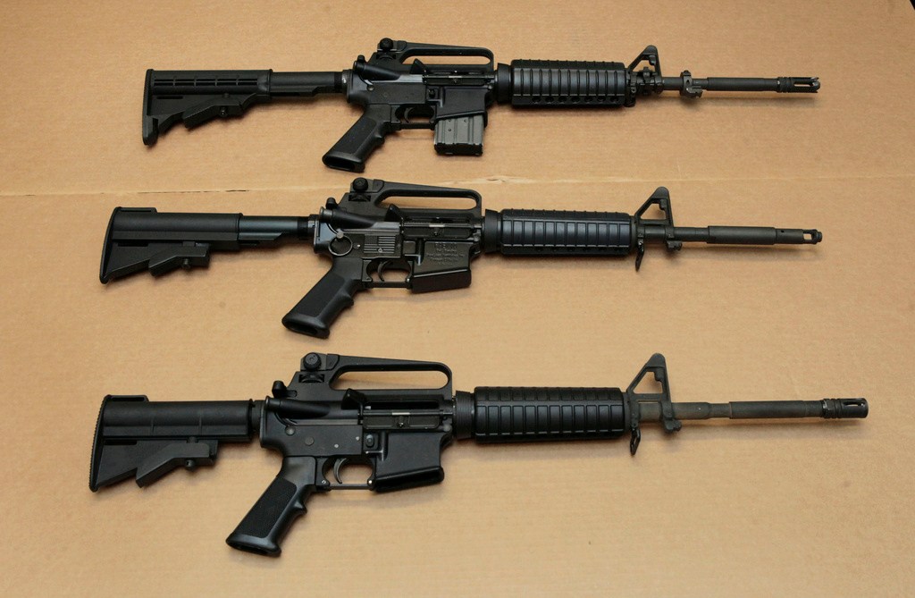 FILE – Three variations of the AR-15 assault rifle are displayed at the California Department of Justice in Sacramento, Calif., on Aug. 15, 2012. (AP Photo/Rich Pedroncelli, File)