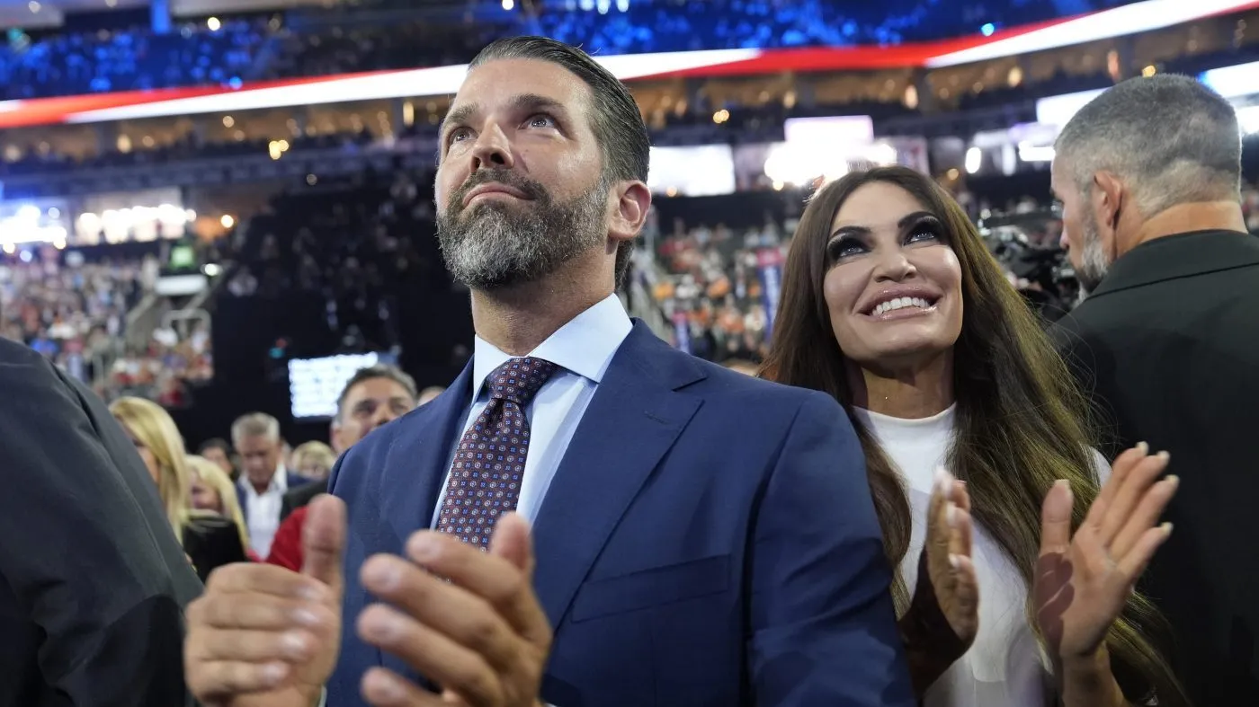 Donald Trump Jr., and his fiancé Kimberly Guilfoyle, watch the roll call of states during the first day of the Republican National Convention on July 15, 2024, in Milwaukee.
