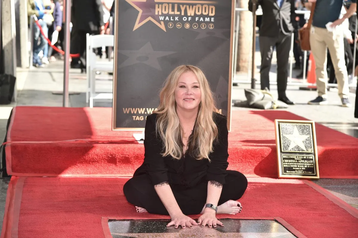 FILE – Christina Applegate poses at a ceremony honoring her with a star on the Hollywood Walk of Fame in Los Angeles on Nov. 14, 2022. (Photo by Richard Shotwell/Invision/AP, File)