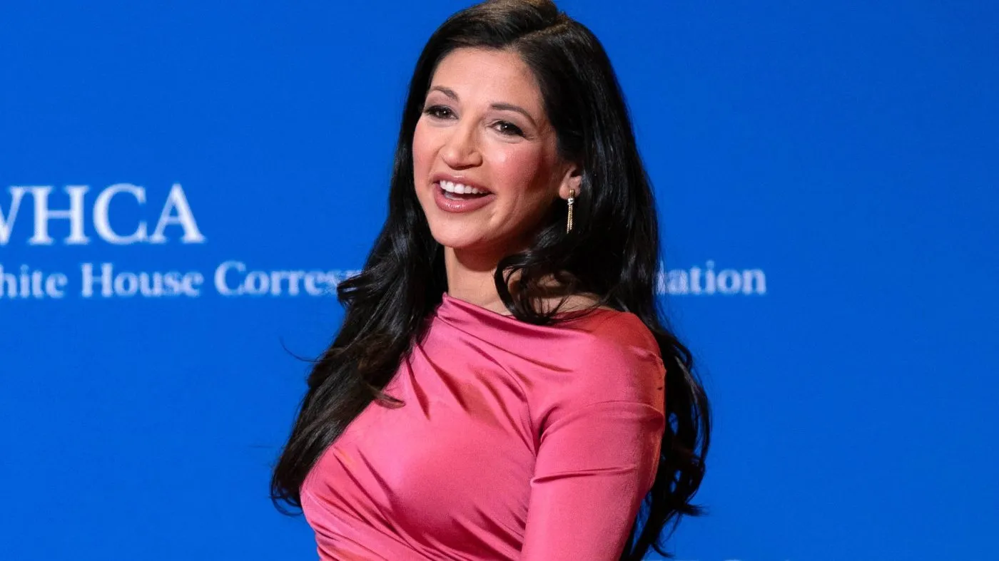 Katie Miller poses for photographers as she arrives at the annual White House Correspondents’ Association dinner in Washington, April 25, 2026.