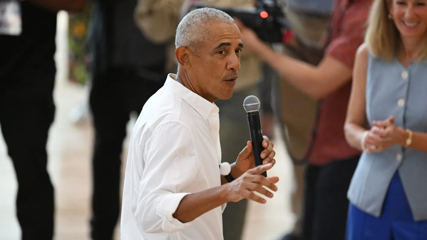Former President Barack Obama speaks while WNBA commissioner Cathy Engelbert, right, listens during an WNBA All-Star practice at the Obama Presidential Center in Chicago, Friday, July 24, 2026.