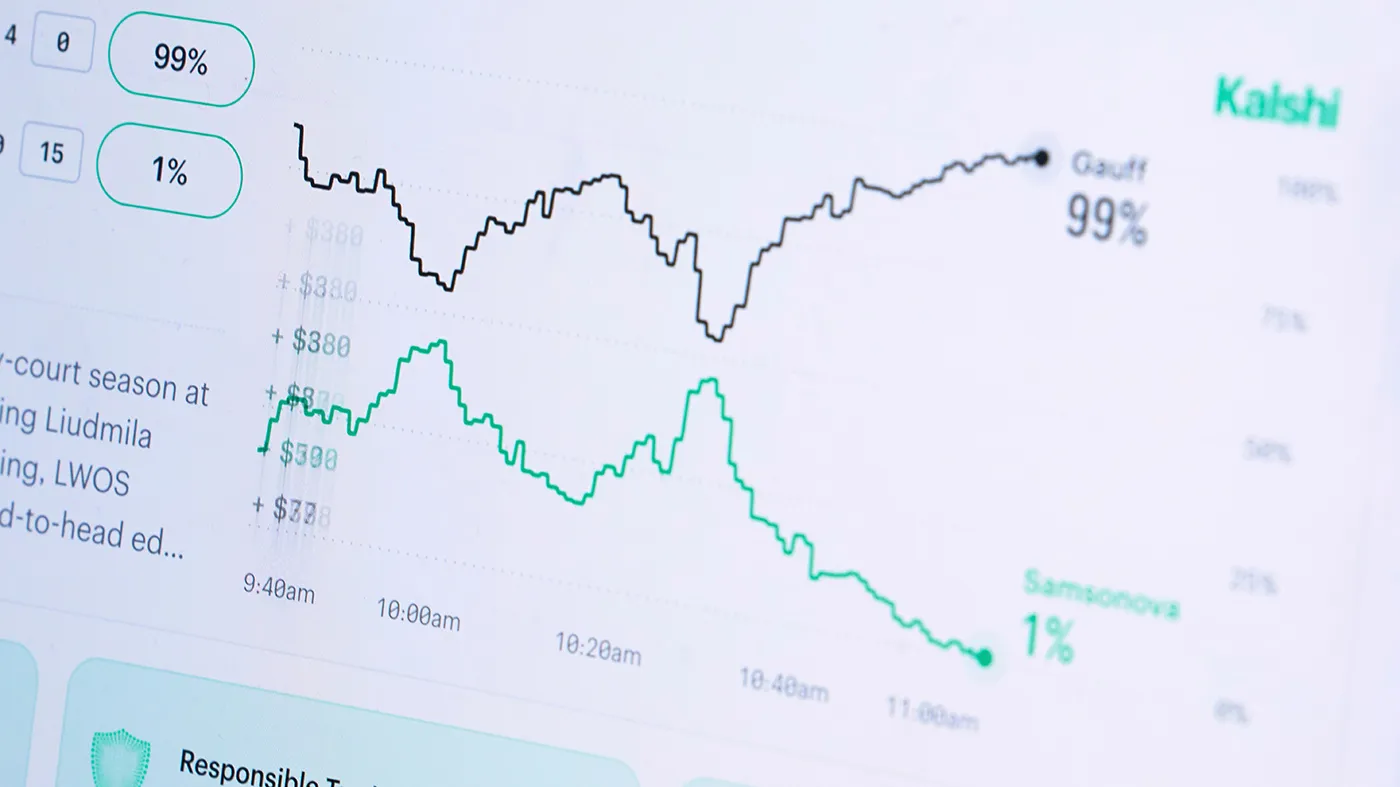 A laptop screen displays trades on the Kalshi website, April 16, 2026, in Portland, Ore.