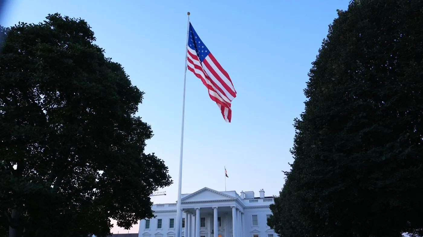 The American flag flies on the North Lawn of the White House Monday, Sept. 21, 2026, in Washington. (AP Photo/Mark Schiefelbein)