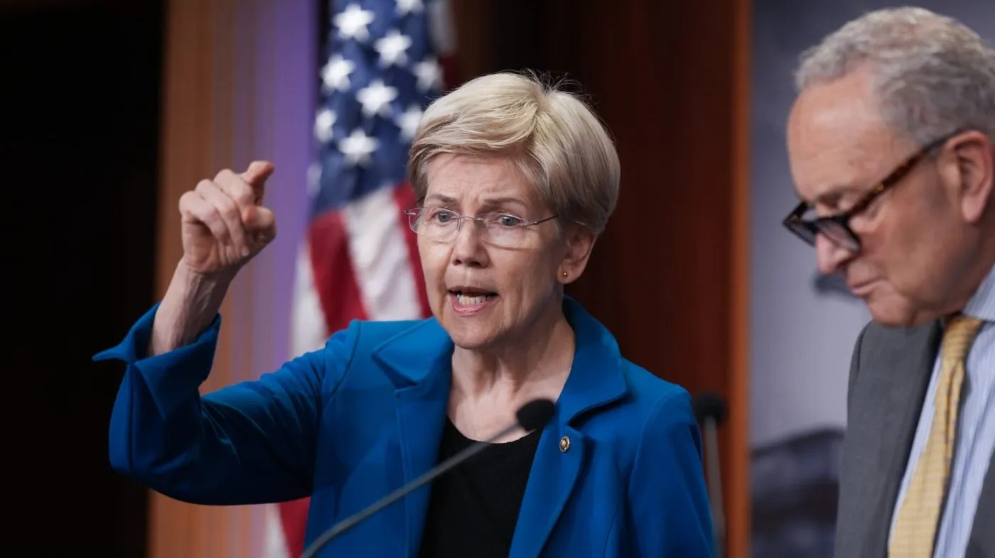 Sen. Elizabeth Warren (D-Mass.), the ranking member of the Senate Banking Committee, joins Senate Minority Leader Chuck Schumer (D-N.Y.), right, to speak to reporters ahead of the meeting between Chinese President Xi Jinping and President Trump to demand stronger controls to stop the flow of American chips and artificial intelligence technology into China, at the Capitol in Washington, Sept. 23, 2026.