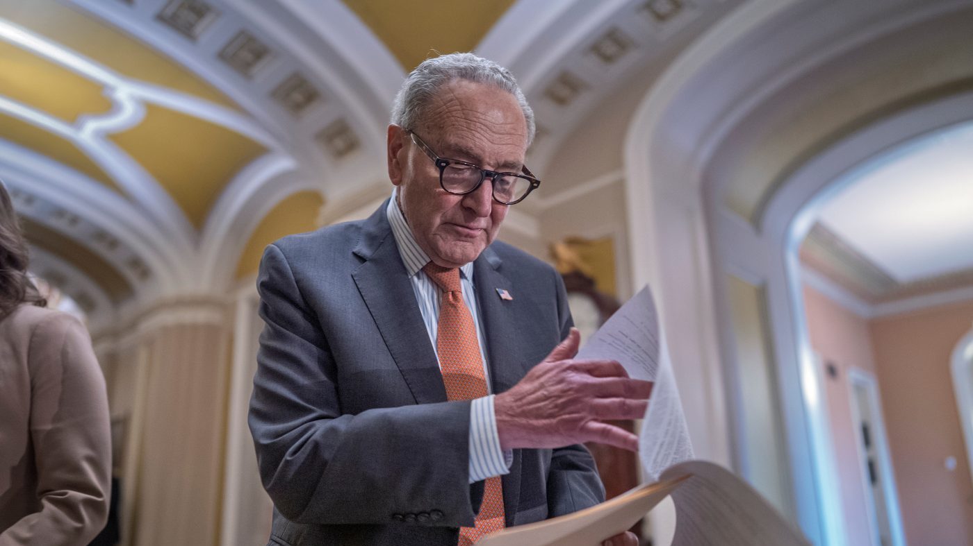 Senate Minority Leader Chuck Schumer, D-N.Y., looks over his notes as he speaks with reporters after a closed-door meeting with fellow Democrats, at the Capitol in Washington, Tuesday, Sept. 29, 2026. (AP Photo/J. Scott Applewhite)