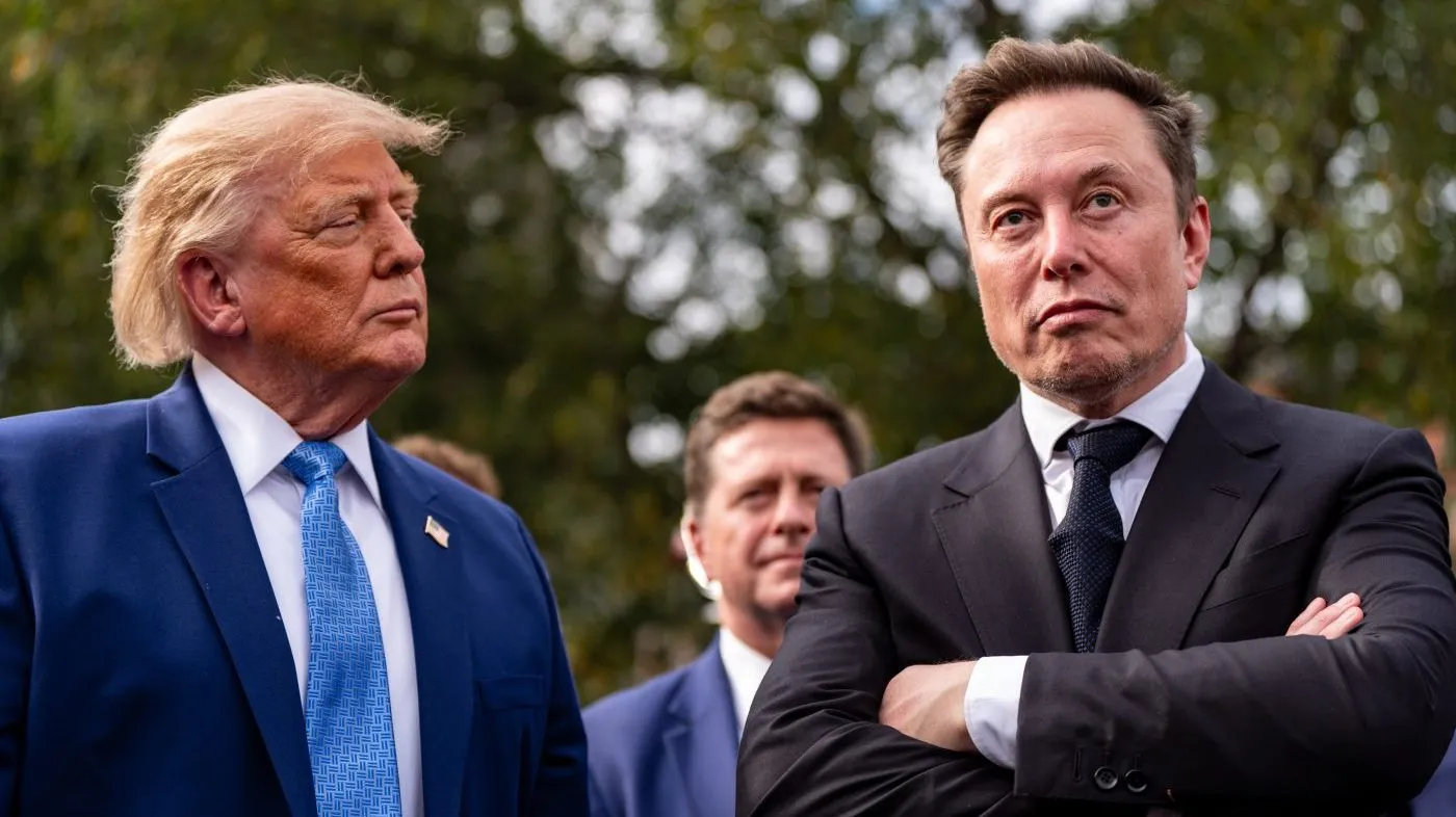 President Donald Trump listens as Elon Musk speaks outside the West Wing of the White House, Tuesday, Sept. 29, 2026, in Washington.