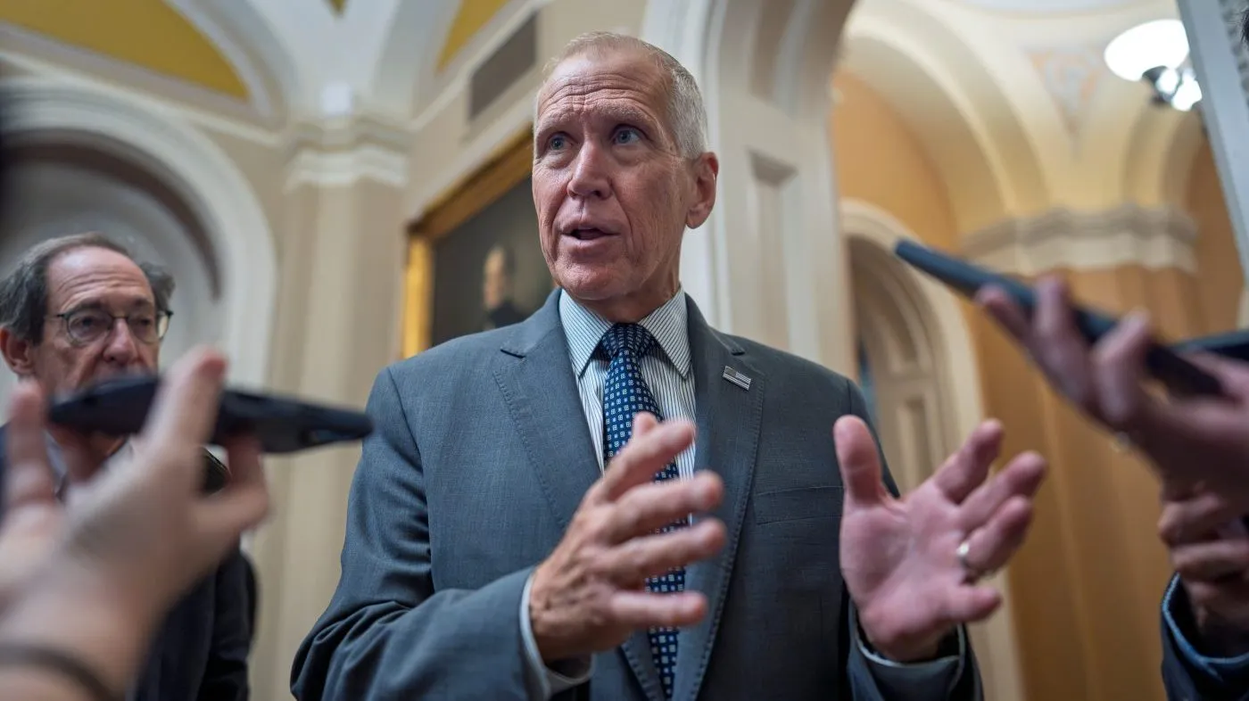 Sen. Thom Tillis (R-N.C.) speaks with reporters on the way to a closed-door meeting with fellow Republicans at the Capitol in Washington, Sept. 29, 2026.