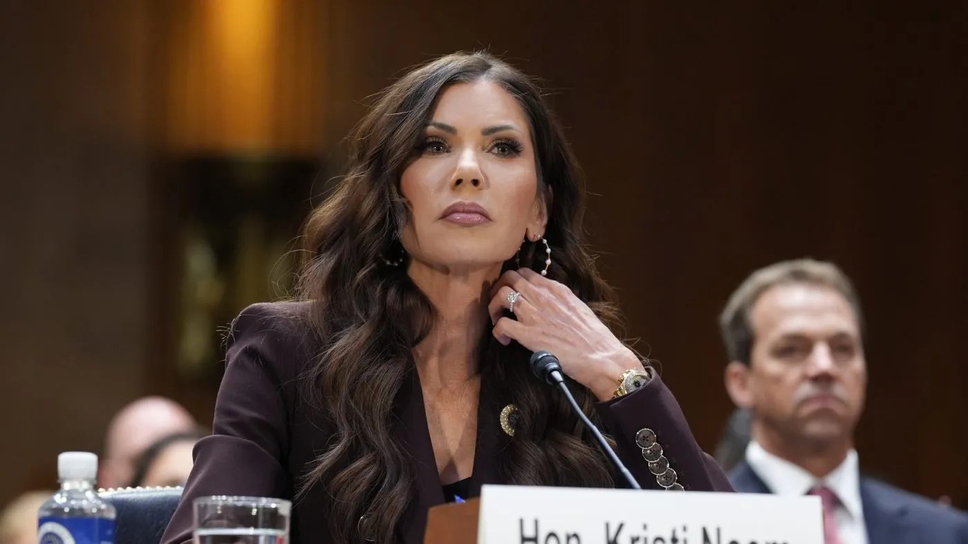 FILE – Homeland Security Secretary Kristi Noem, center, with her husband Bryon Noem, right, seated behind her, appears for an oversight hearing before the Senate Judiciary Committee, at the Capitol in Washington, March 3, 2026. (AP Photo/J. Scott Applewhite, File)