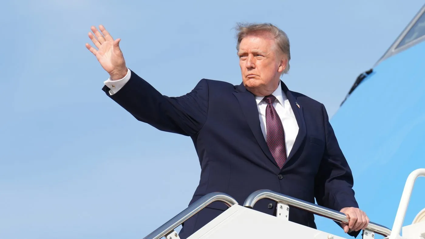 President Donald Trump boards Air Force One at Joint Base Andrews, Md., Friday, Oct. 2, 2026, en route to Alabama