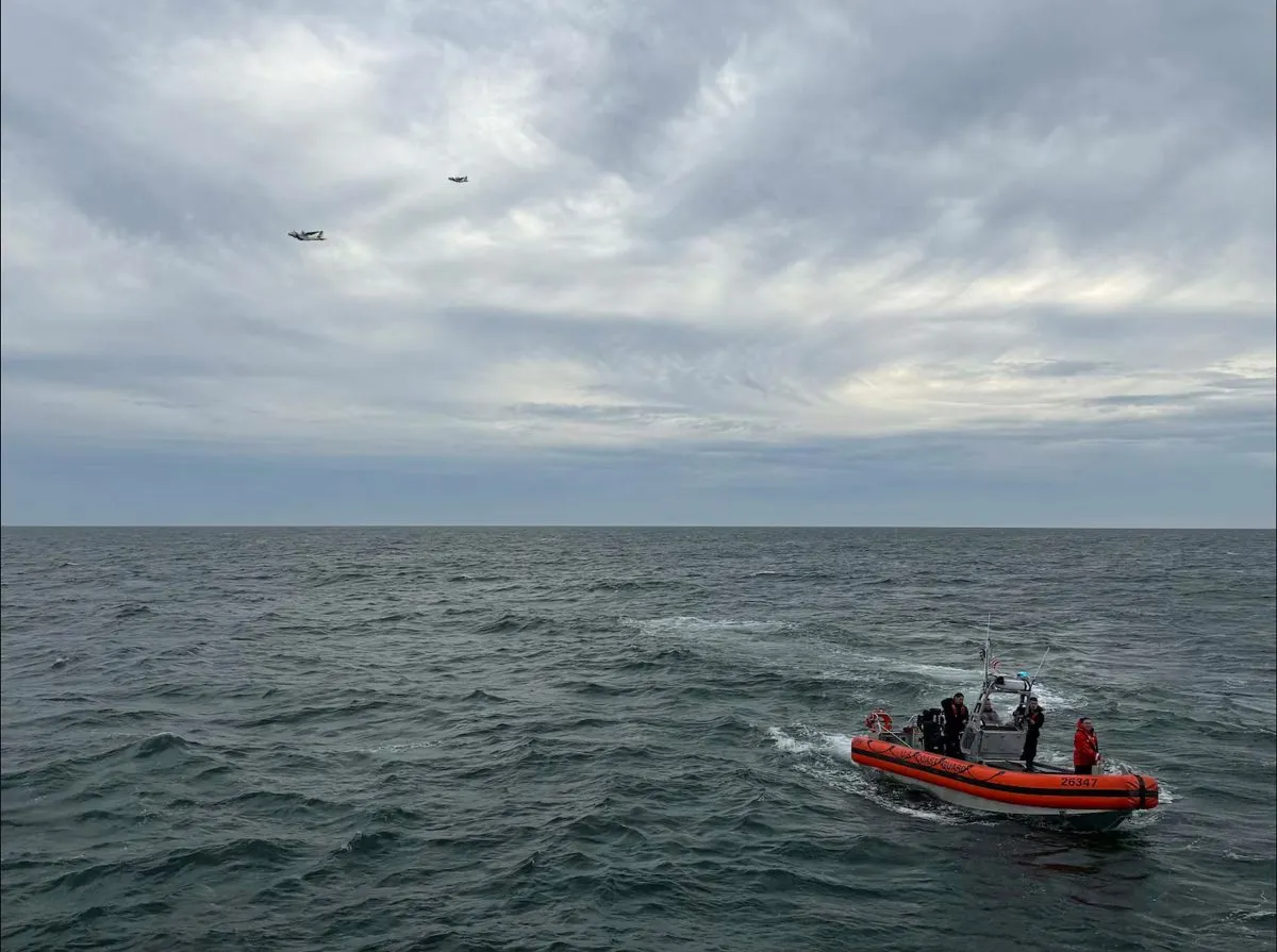 In this photo released by U.S. Coast Guard, crew members search by air and on the water for a Boston-bound air ambulance that vanished off the coast of Nantucket, Massachusetts, on Saturday, Oct. 3, 2026. (U.S. Coast Guard via AP)