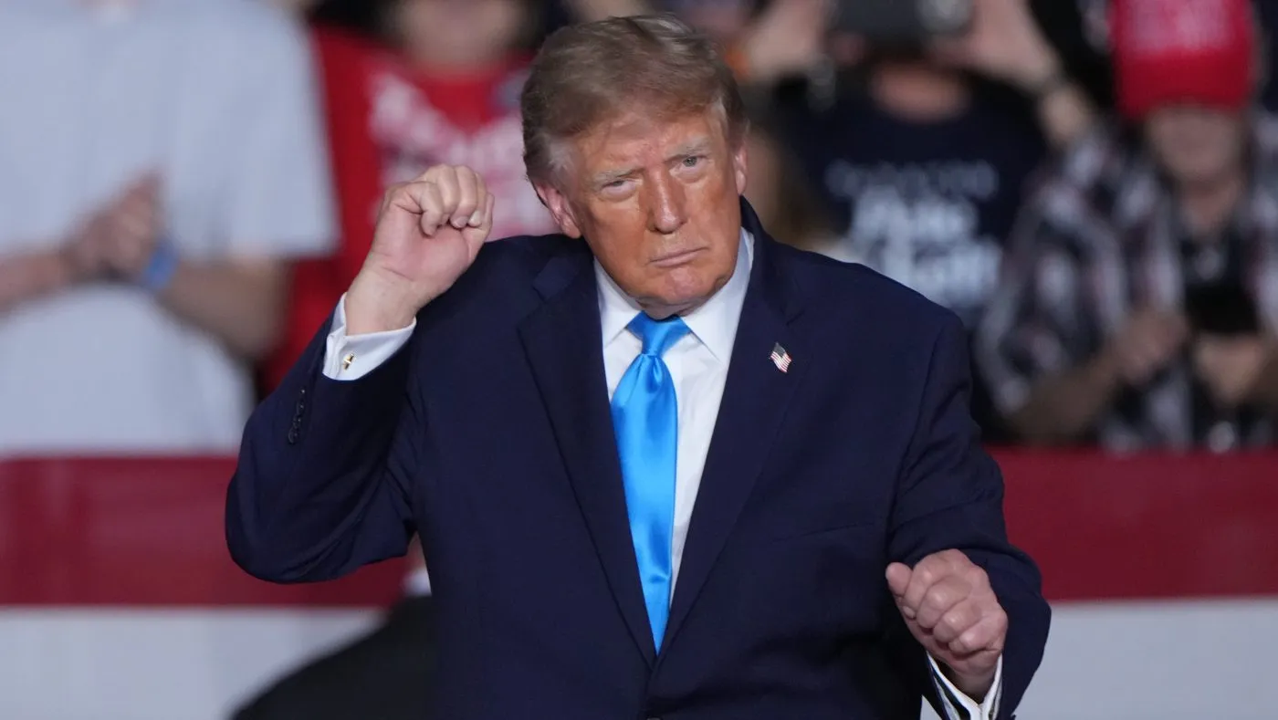 President Donald Trump dances at a campaign rally at the Pinnacle Bank Expo Center, Monday, Oct. 5, 2026, in Grand Island, Neb. (AP Photo/Charlie Riedel)