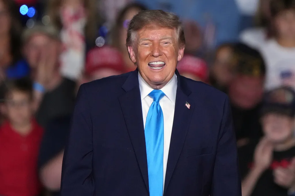 President Donald Trump smiles at a campaign rally at the Pinnacle Bank Expo Center, Monday, Oct. 5, 2026, in Grand Island, Neb. (AP Photo/Charlie Riedel)