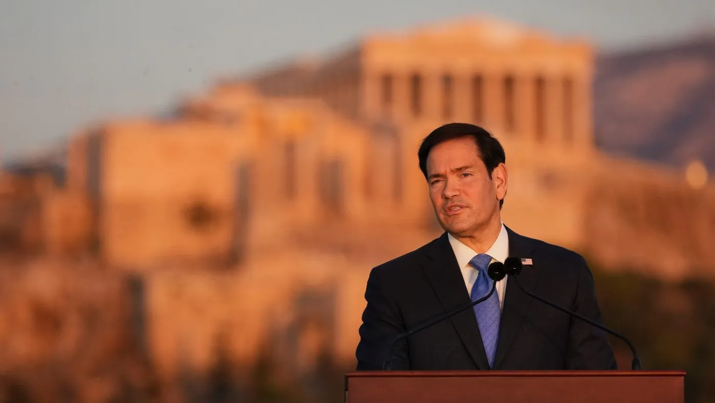 Secretary of State Marco Rubio speaks at the Pnyx hill, where ancient Athenians held democratic assemblies, with the ancient Parthenon temple atop the Acropolis in the background on Oct. 7, 2026, in Athens, Greece.