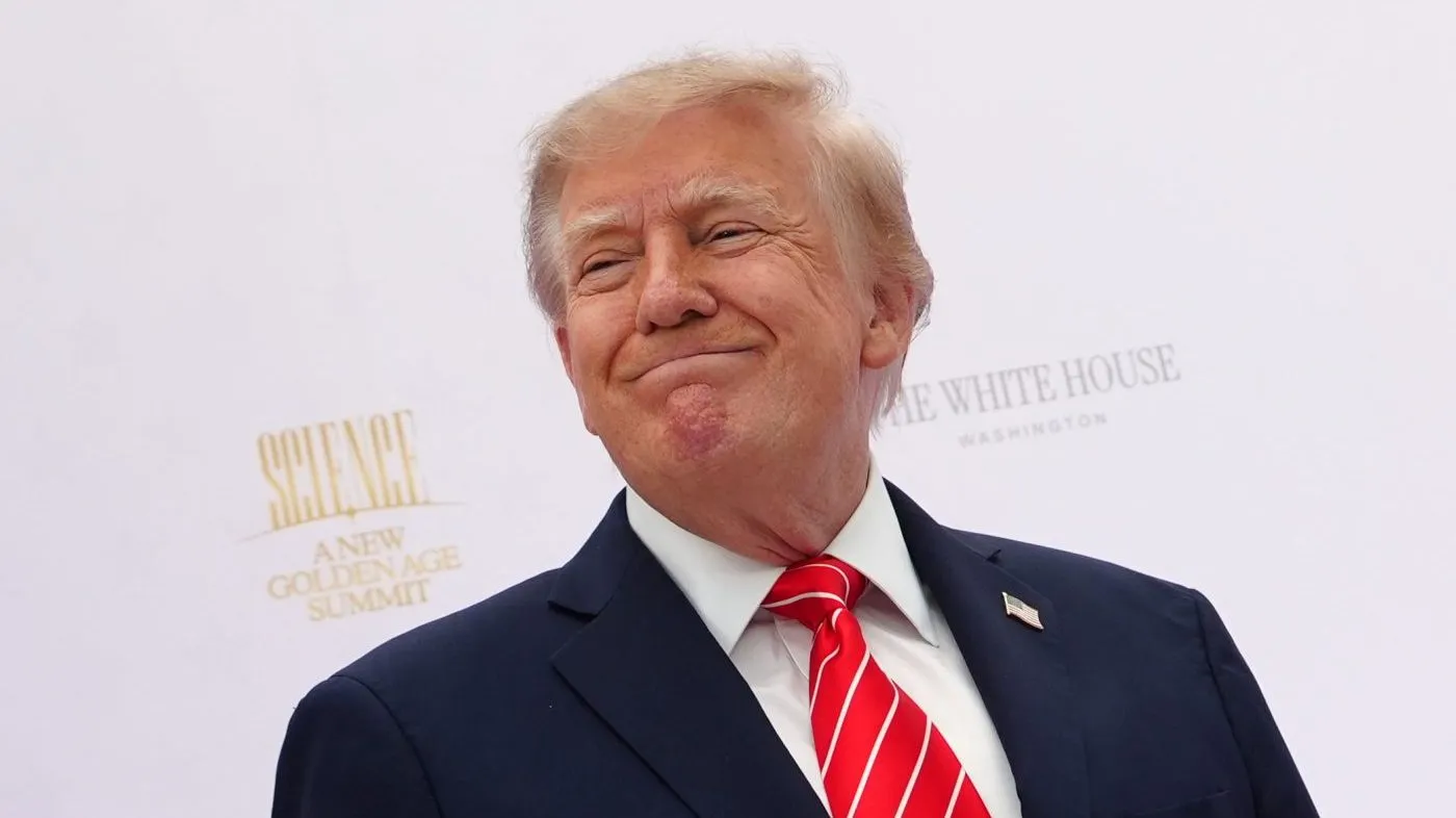 President Trump arrives to speak during an event at the U.S. Institute of Peace on Oct. 8, 2026, in Washington.