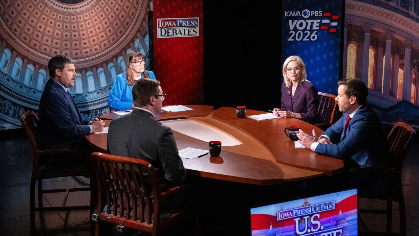 U.S. Senate candidates Rep. Ashley Hinson, R-Iowa, and Rep. Josh Turek, D-Council Bluffs, take questions during a debate Wednesday, Oct. 7, 2026, in Johnston, Iowa. (Cody Scanlan/The Des Moines Register via AP, Pool)