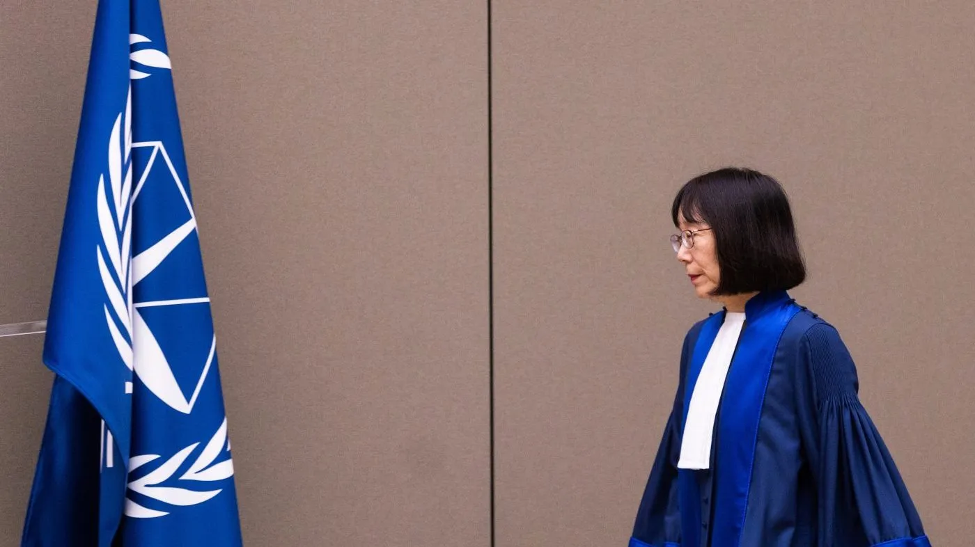 FILE – Judge Tomoko Akane walks before delivering the verdict in the Al Hassan case at the International Criminal Court in The Hague, Netherlands, Wednesday Nov. 20, 2024. (Eva Plevier/Pool Photo via AP, file)