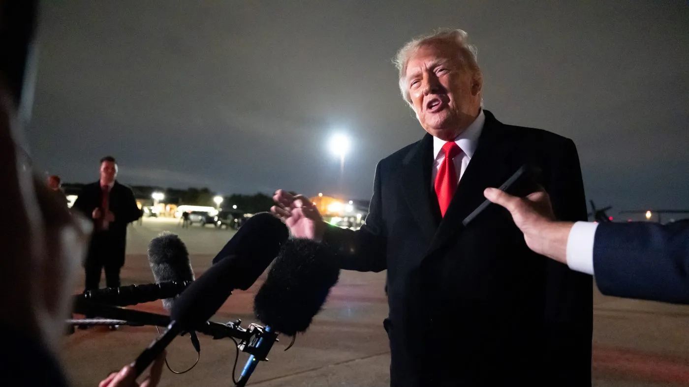 President Donald Trump speaks with reporters as he arrives on Air Force One, Saturday, Oct. 10, 2026, at Joint Base Andrews, Md. (AP Photo/Alex Brandon)