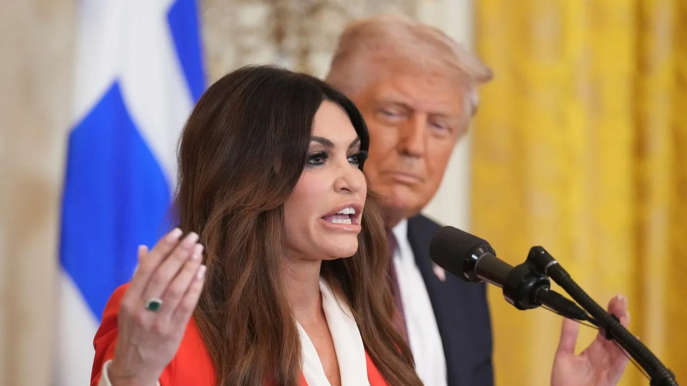 FILE – Kimberly Guilfoyle speaks as President Donald Trump listens at a reception celebrating Greek Independence Day in the East Room of the White House, March 24, 2025, in Washington. (AP Photo/Jacquelyn Martin, File)
