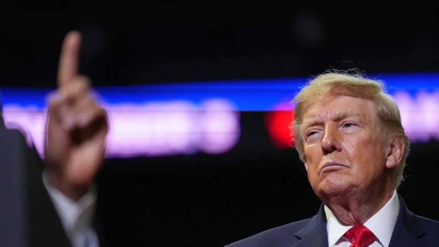 President Donald Trump listens as gubernatorial candidate Vivek Ramaswamy speaks at a campaign rally at the Covelli Centre, in Youngstown, Ohio, Monday, Oct. 12, 2026. (AP Photo/Jacquelyn Martin)