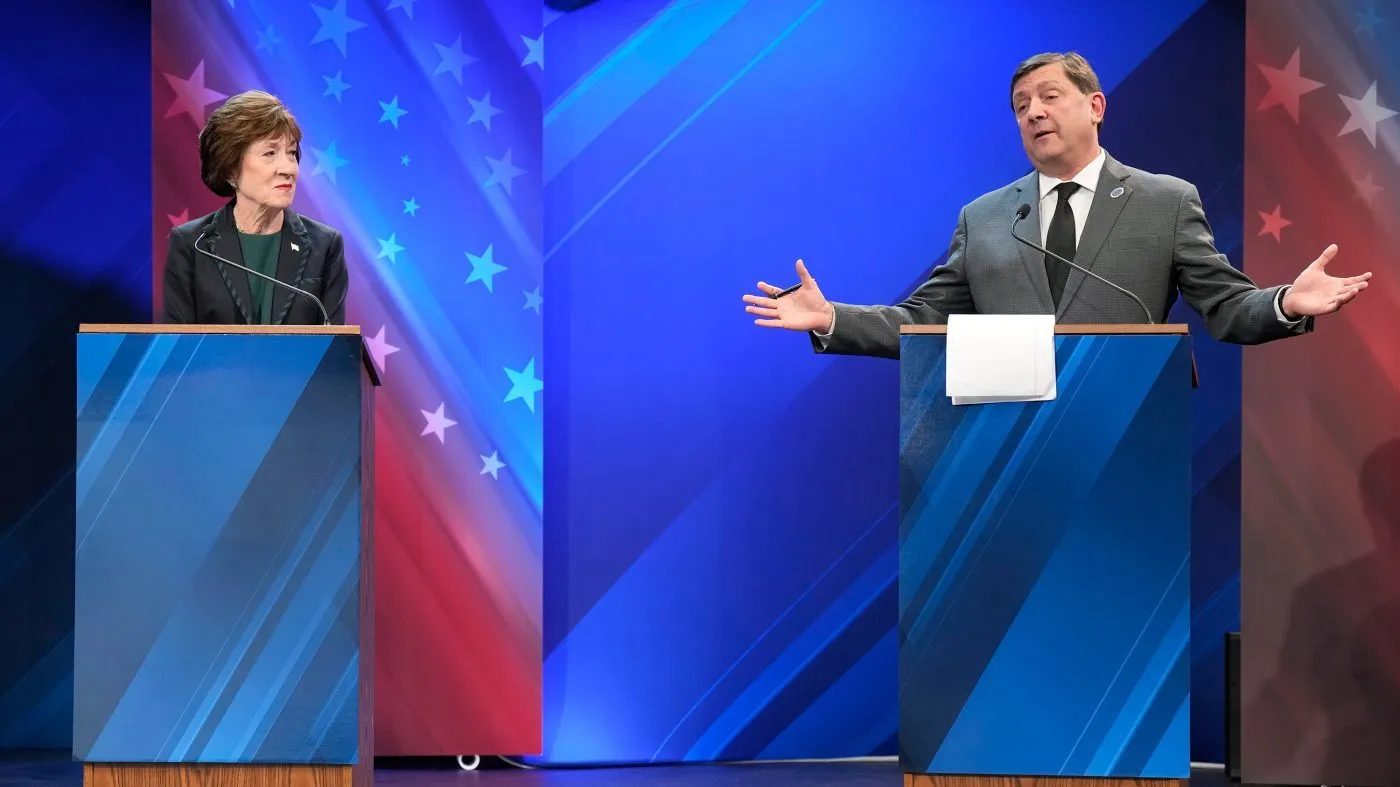 Sen. Susan Collins (R) looks to Troy Jackson (D) as he answers a question during the final Maine U.S. Senate debate in Bangor, Maine, Oct. 15, 2026.