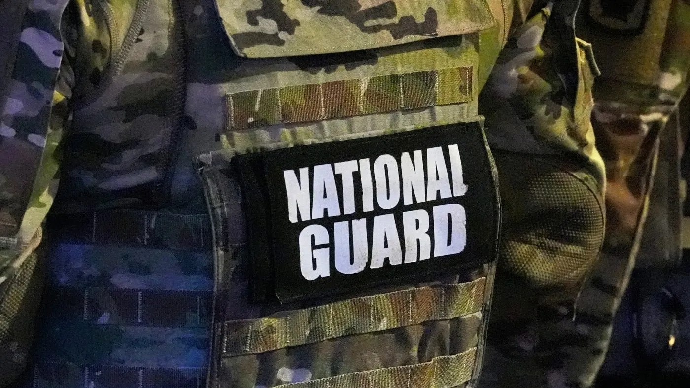FILE – A member of the National Guard stands watch on Beale St., July 17, 2026, in Memphis, Tenn. (AP Photo/George Walker IV, File)