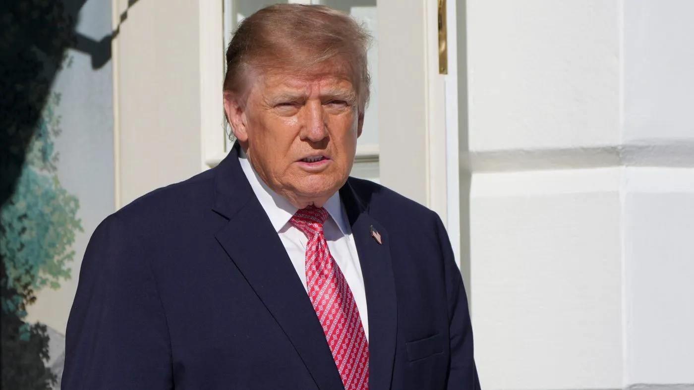 President Donald Trump walks to speak with reporters before departing on Marine One from the South Lawn of the White House, Monday, Oct. 19, 2026, in Washington. (AP Photo/Alex Brandon)