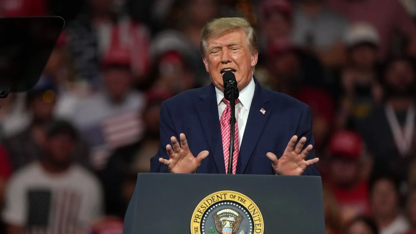 President Donald Trump speaks at a campaign rally at Heartland Credit Union Arena, Monday, Oct. 19, 2026, in Park City, Kan. (AP Photo/Charlie Riedel)