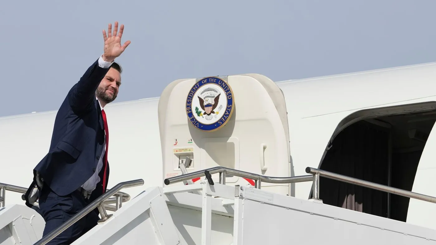 Vice President Vance waves as he boards Air Force Two at North Platte Regional Airport in North Platte, Neb., on Oct. 22, 2026.