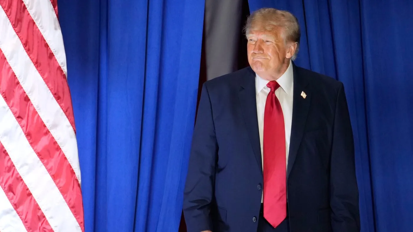 President Donald Trump arrives at a campaign rally at the Sioux Gateway Airport, Thursday, Oct. 22, 2026, in Sioux City, Iowa. (AP Photo/Charlie Neibergall)