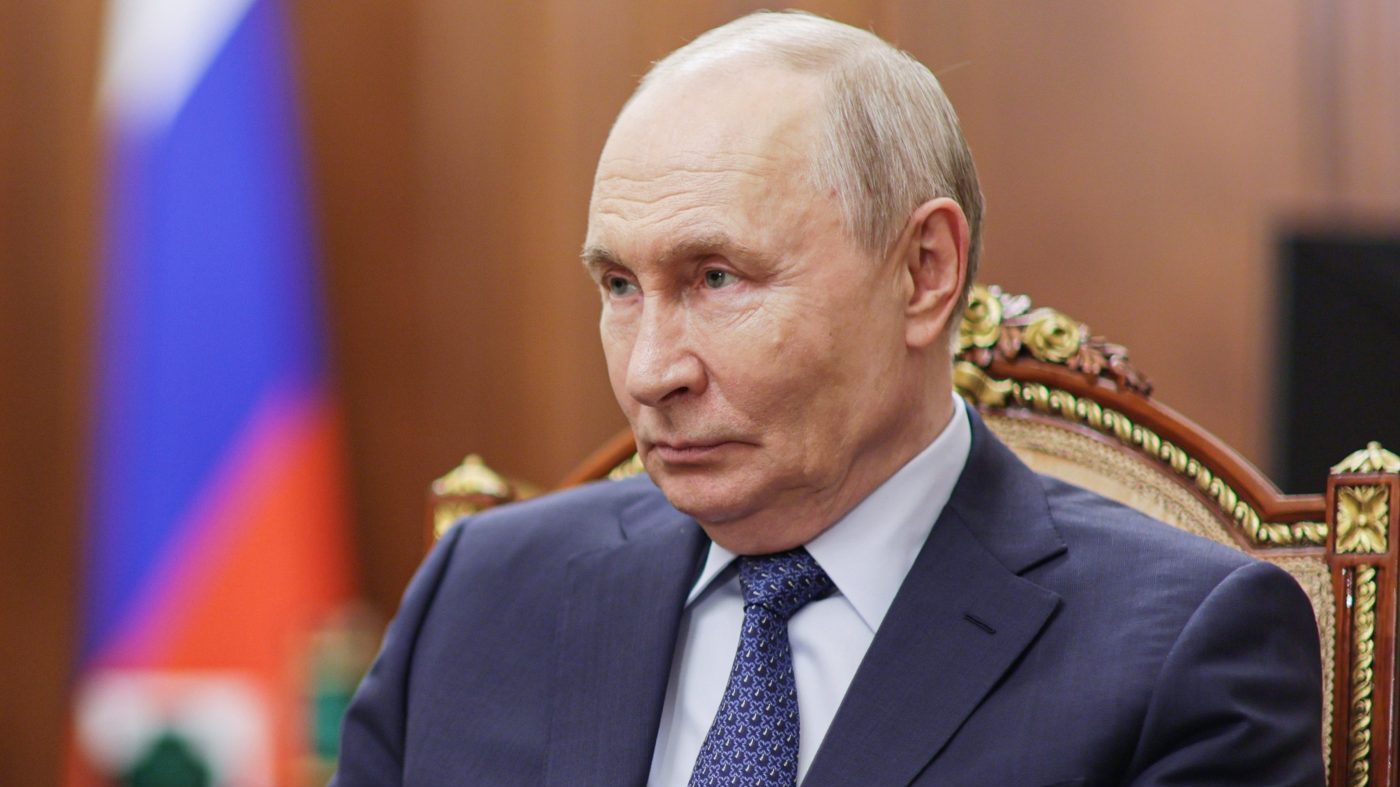 Russian President Vladimir Putin speaks with Gazprombank CEO Andrei Akimov during their meeting at the Kremlin in Moscow, Monday, Oct. 26, 2026. (Mikhail Metzel, Sputnik, Kremlin Pool Photo via AP)