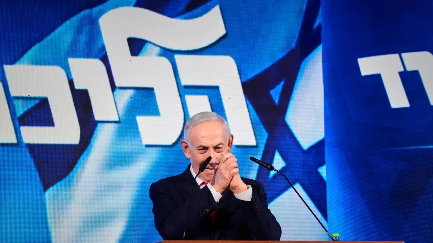 Israeli Prime Minister Benjamin Netanyahu greets his supporters at Likud party headquarters in Jerusalem after the release of the first exit poll results in Israel’s general election, Wednesday, Oct. 28, 2026. (AP Photo/Ohad Zwigenberg)