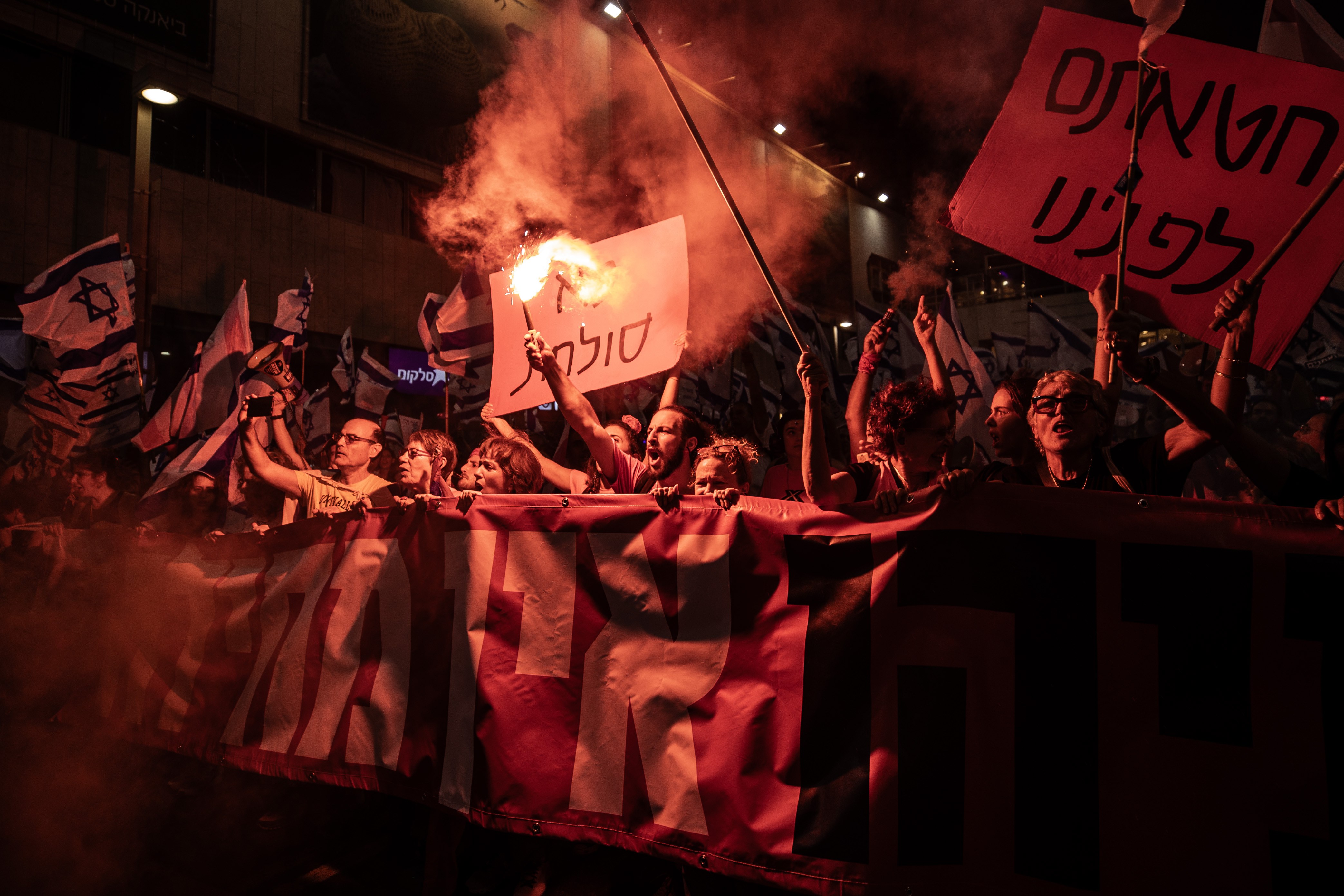 TEL AVIV, ISRAEL – SEPTEMBER 23: Israeli protesters marching ‘for judicial independence’, after the coalition government led by Prime Minister Benjamin Netanyahu passed the controversial ‘judicial reform’ law in parliament in Tel Aviv, Israel on September 23, 2023. (Photo by Mostafa Alkharouf/Anadolu Agency via Getty Images)
