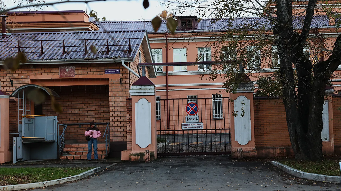 A pedestrian stands at the building of the Irkutsk Anti-Plague Research Institute of Siberia and the Far East in Irkutsk, Russi, on Oct. 7, 2026. (Associated Press)