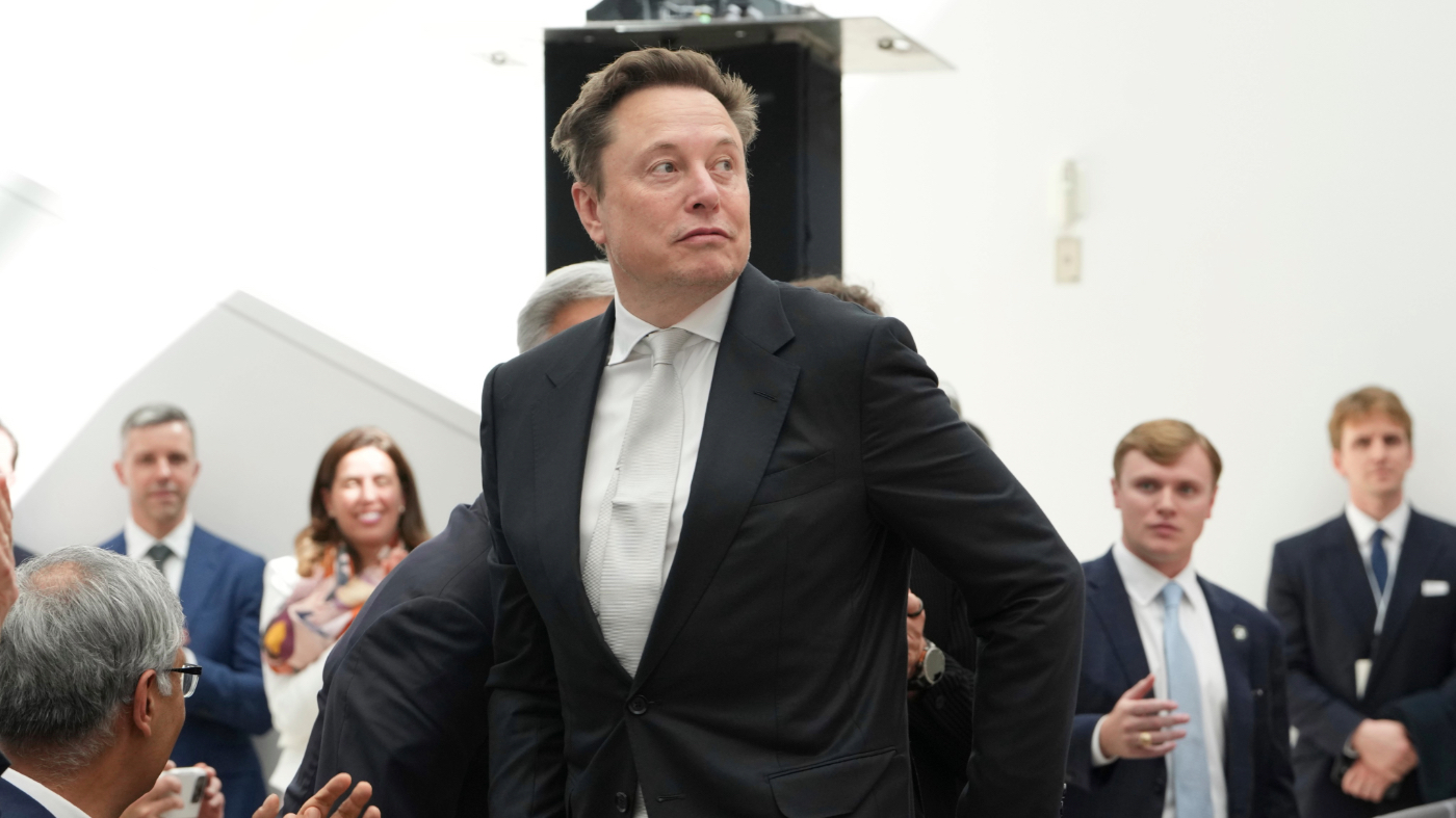 Elon Musk walks to accept the National Medal of Science during an event at the U.S. Institute of Peace, Thursday, Oct. 8, 2026, in Washington. (AP Photo/Julia Demaree Nikhinson)