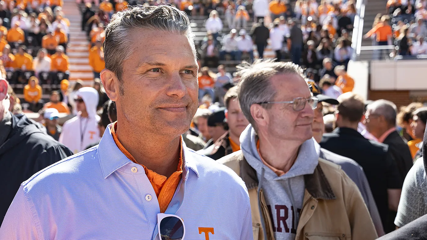 Secretary of Defense Pete Hegseth, with Rep. Tim Burchett (R-Tenn.) right, watches warm ups before an NCAA college football game between Tennessee and Alabama, Saturday, Oct. 17, 2026, in Knoxville, Tenn.
