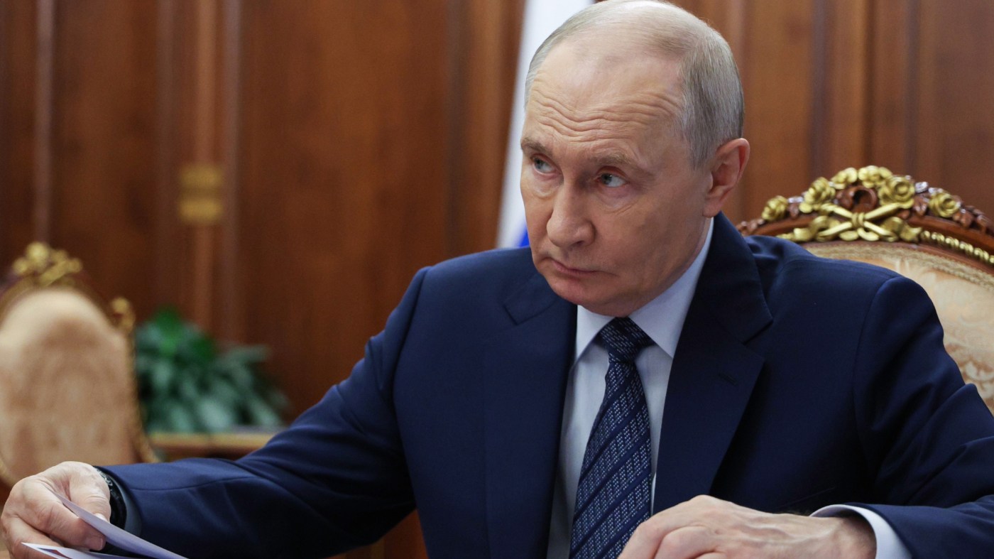 Russian President Vladimir Putin listens to Sports Minister Mikhail Degtyarev during their meeting at the Kremlin in Moscow, Tuesday, Oct. 20, 2026. (Mikhail Metzel, Sputnik, Kremlin Pool Photo via AP)